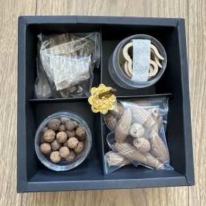 Set Vietnam agarwood products with:
1. 2 tola agarwood chip
2. 16 pieces of cloudy incense
3. 15 buds incense
4. 20 pieces round shape incense
5. Stand for stick and cloudy incense burning (gift)